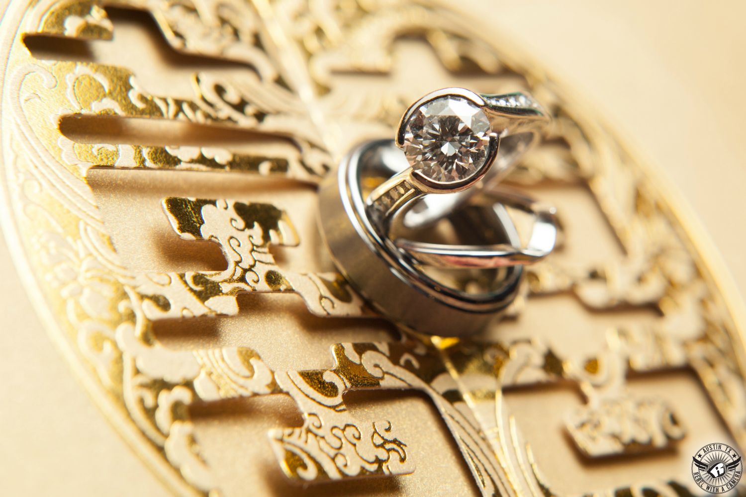 Diamond weddings rings on luxurious golden double luck Chinese character wedding invitation.