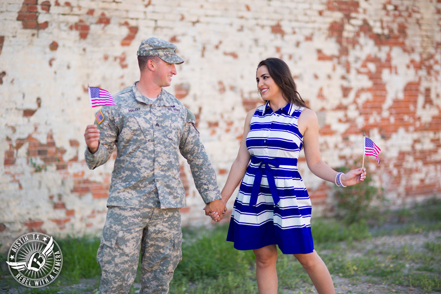 Army engagement pictures in Texas soldier and bride wave American flags