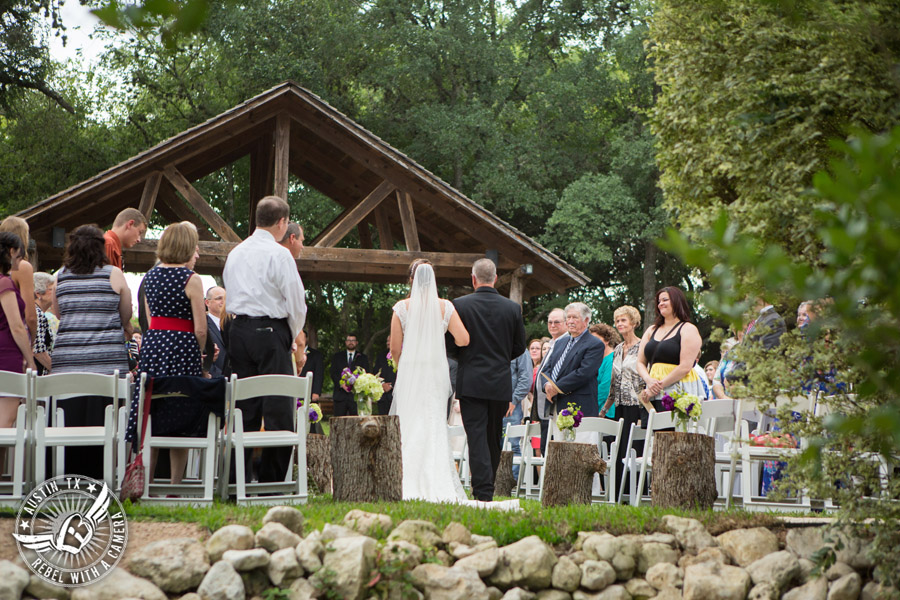 Sage Hall wedding photos at Texas Old Town bride and her father coming down aisle at ceremony site