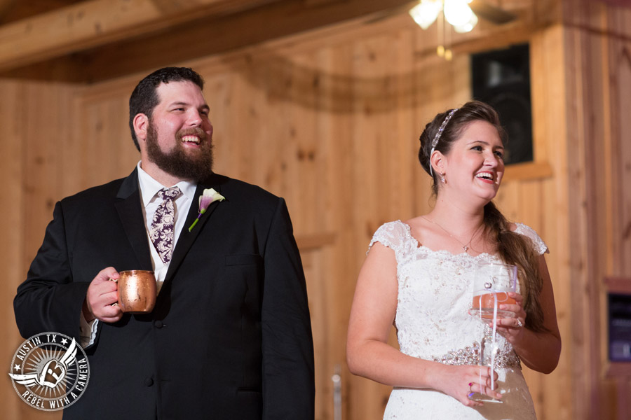 Sage Hall wedding photos at Texas Old Town bride and groom laugh at toast during wedding reception