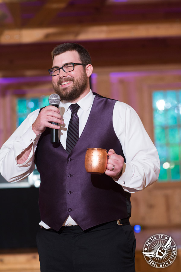 Sage Hall wedding photos at Texas Old Town best man toasts the bride and groom during wedding reception