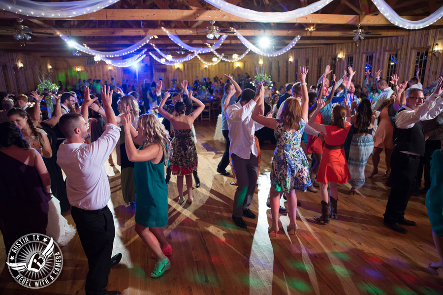 Sage Hall wedding photos at Texas Old Town crowd dances at wedding reception with Greenbelt DJ