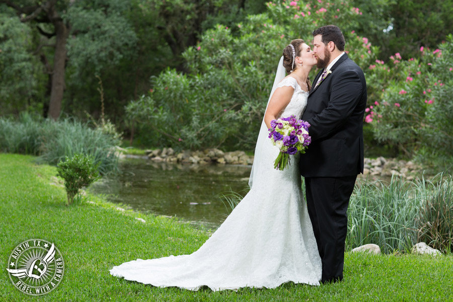 Sage Hall wedding photos at Texas Old Town bride and groom kissing