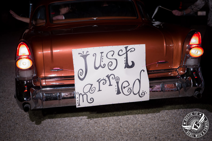 Sage Hall wedding photos at Texas Old Town Just Married sign on vintage car exit vehicle