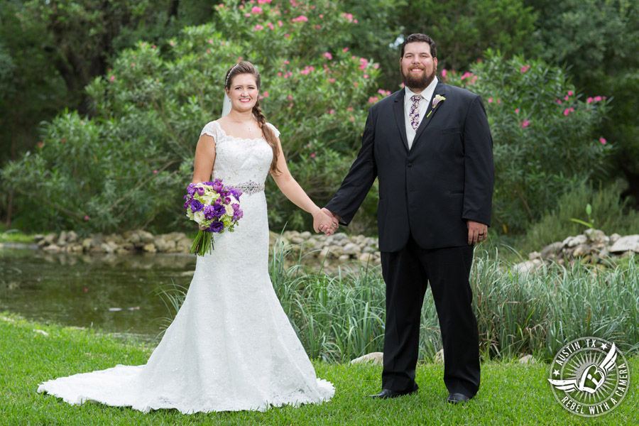 Sage Hall wedding photos at Texas Old Town bride and groom holding hands