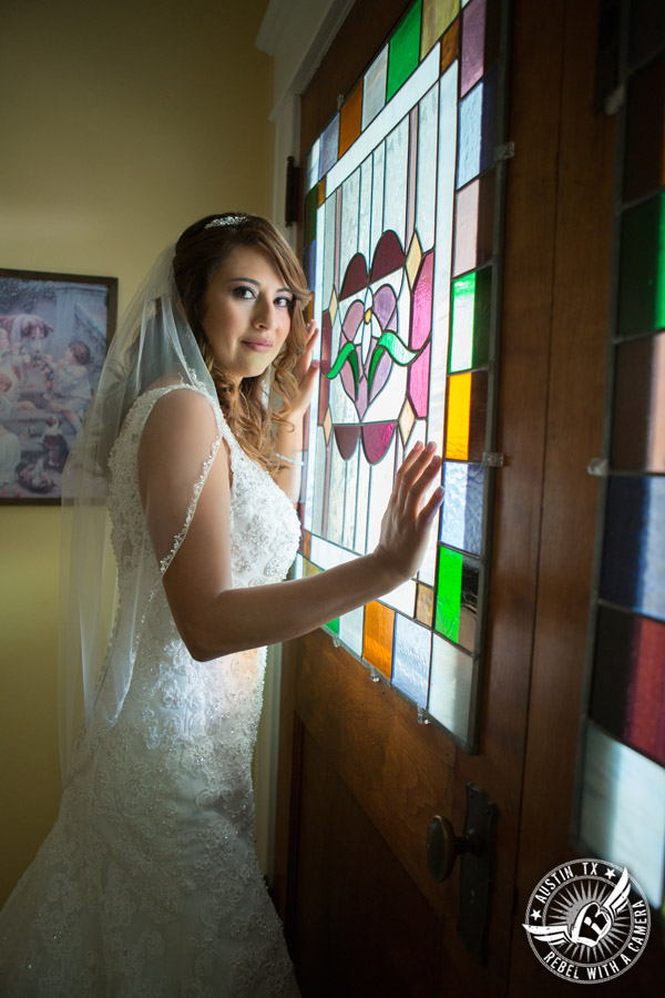 Taylor Mansion wedding photo of bride and stained glass door