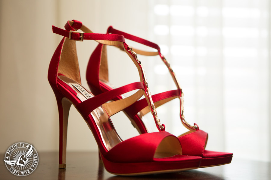 Taylor Mansion wedding photo of red high heel shoes for the bride in bride's room