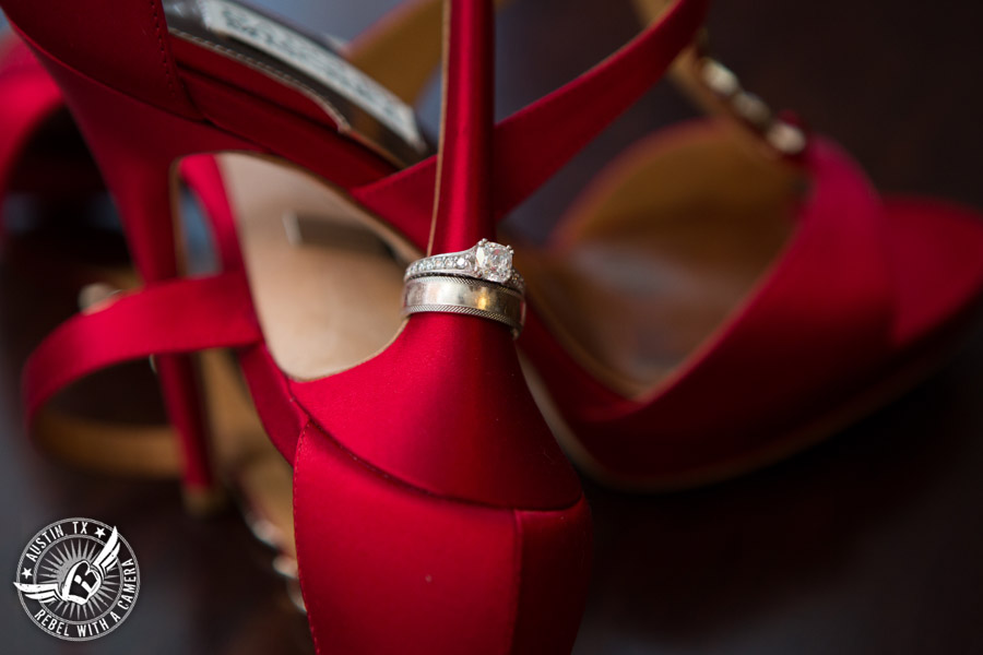 Taylor Mansion wedding photo wedding rings on red high heel shoes for the bride in bride's room