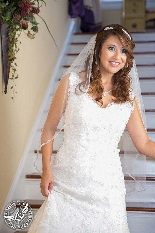 Taylor Mansion wedding photo bride coming down the stairs