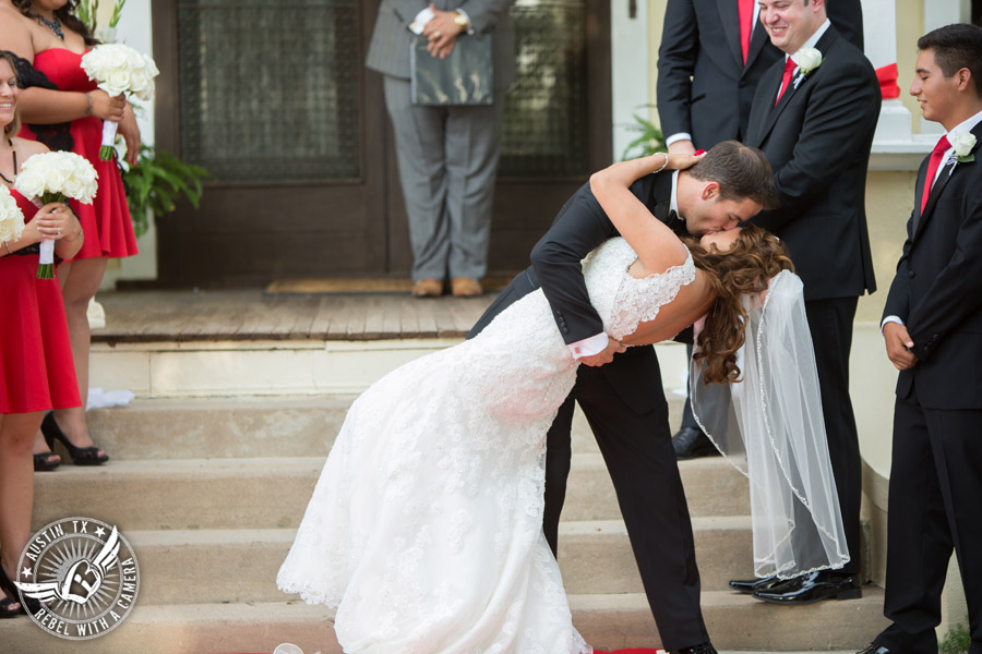 Taylor Mansion wedding photo of bride and groom kiss at wedding ceremony