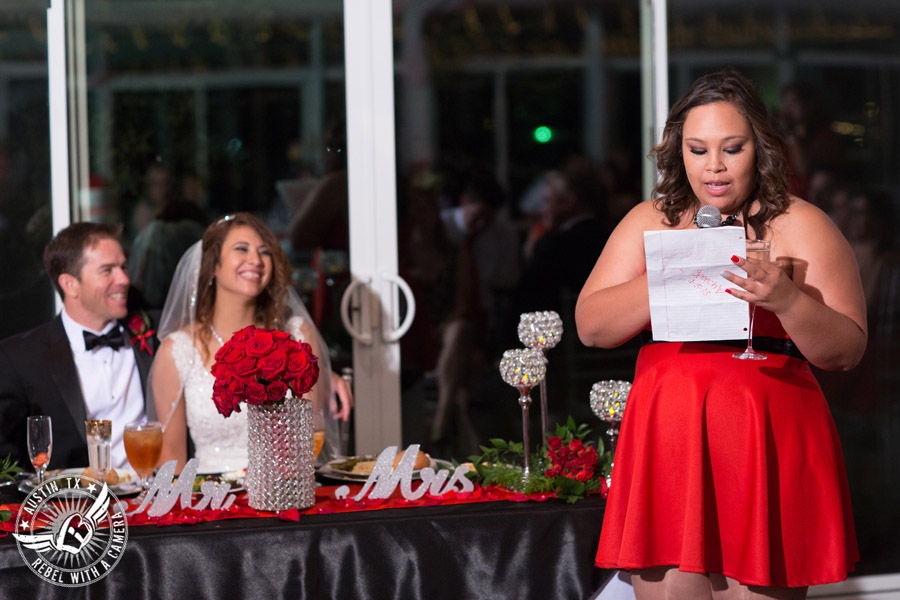 Taylor Mansion wedding photo maid of honor giving toast to bride and groom in Crystal Ballroom