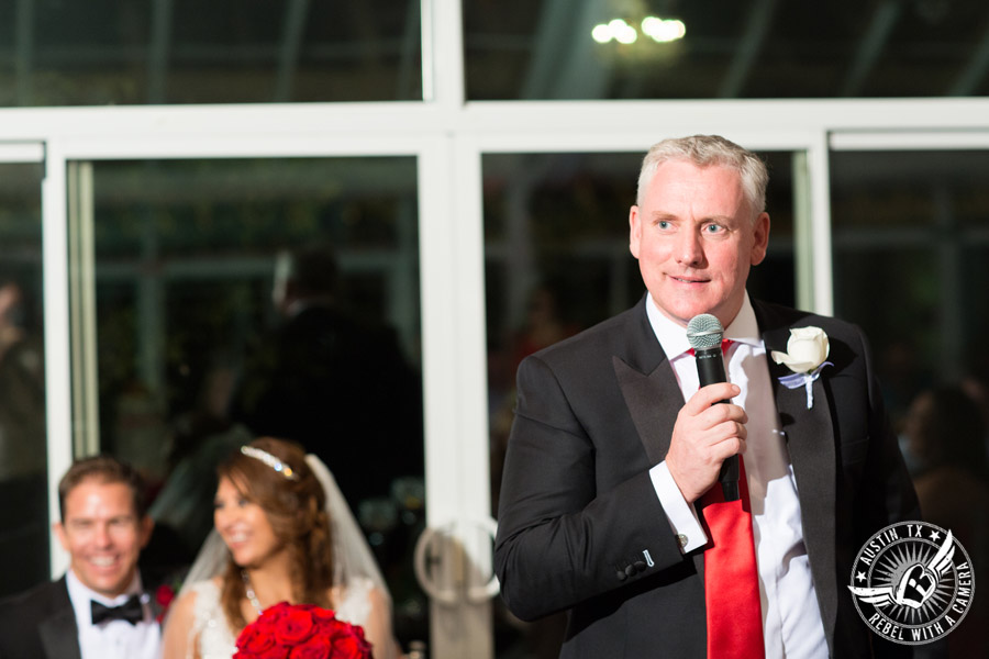 Taylor Mansion wedding photo best man giving toast to bride and groom in Crystal Ballroom