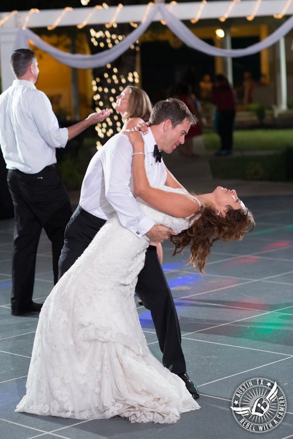 Taylor Mansion wedding photo bride and groom dance on the patio with 1st Class Entertainment DJ Jason