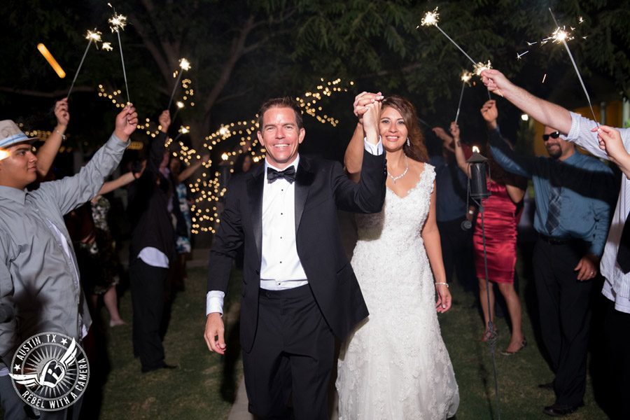 Taylor Mansion wedding photo bride and groom sparkler exit