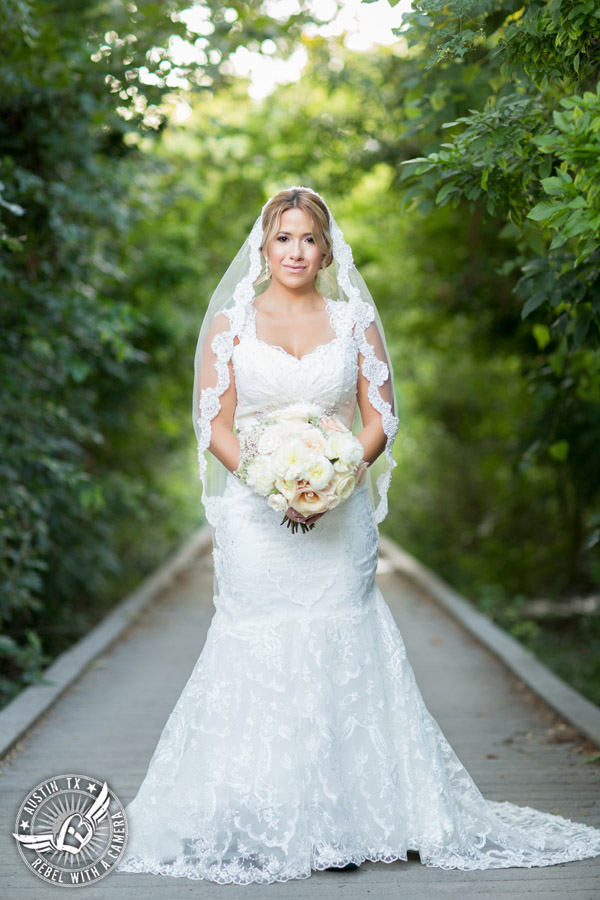 Berry Springs Park and Preserve bridal portrait in Georgetown, Texas, with hair and makeup by Kiss by Katie and bouquet by Sixpence Floral Design