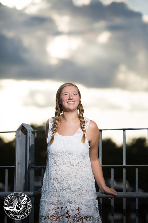 Fun senior portraits on the Lamar Pedestrian Bridge in downtown Austin, Texas.