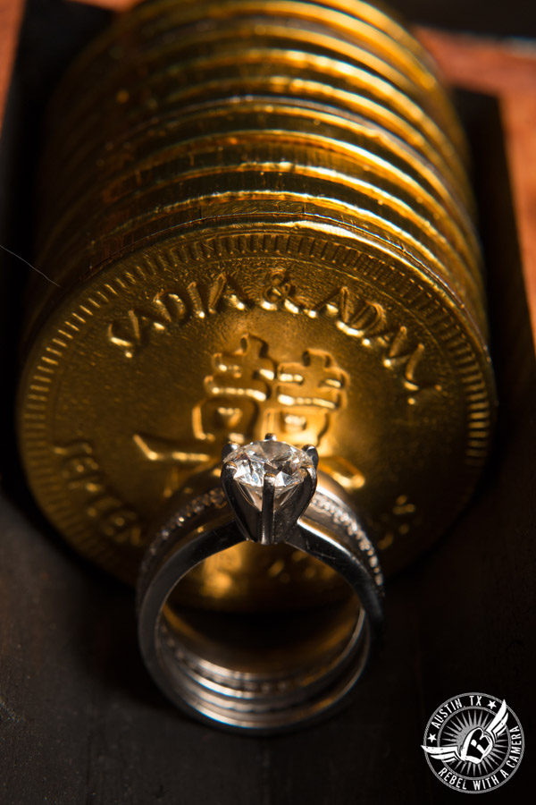Austin wedding photographer at Olive and June - wedding ring shot with gold coins