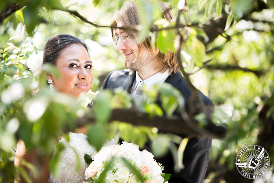 Austin wedding photographer at Olive and June - bride and groom in the trees