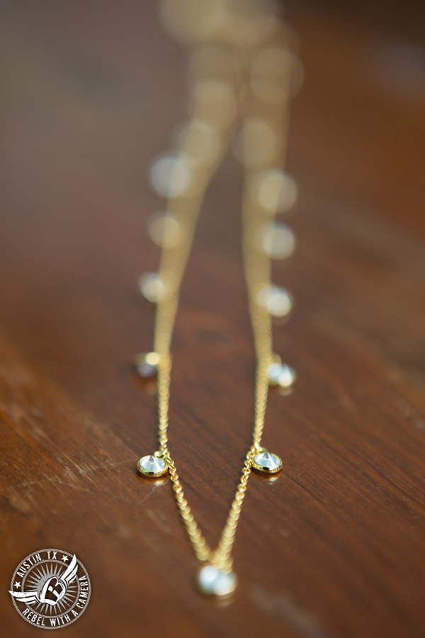 Hamilton Twelve wedding photos - gold and rhinestone necklace in the bride's room