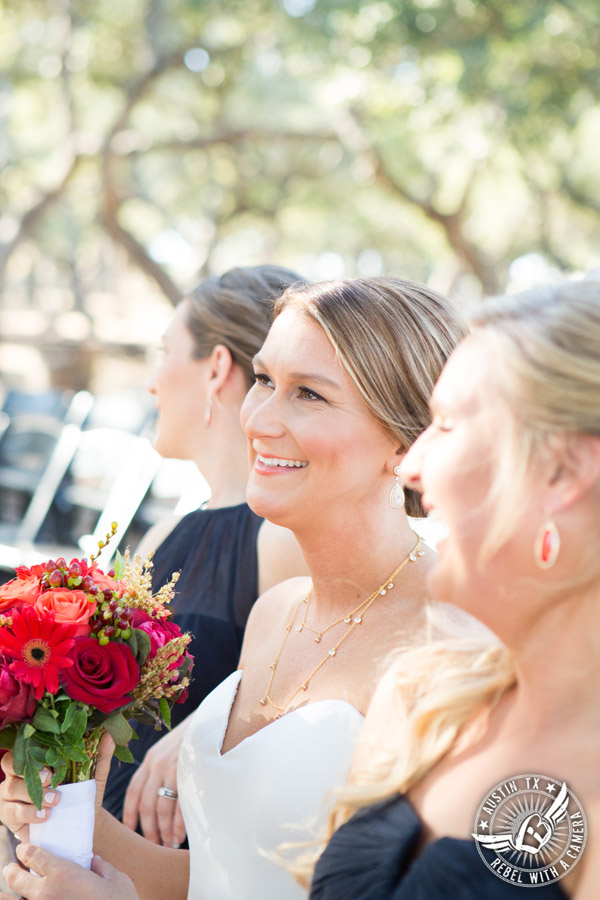 Hamilton Twelve wedding photos - bride laughs with bridesmaids - makeup by Kiss by Katie