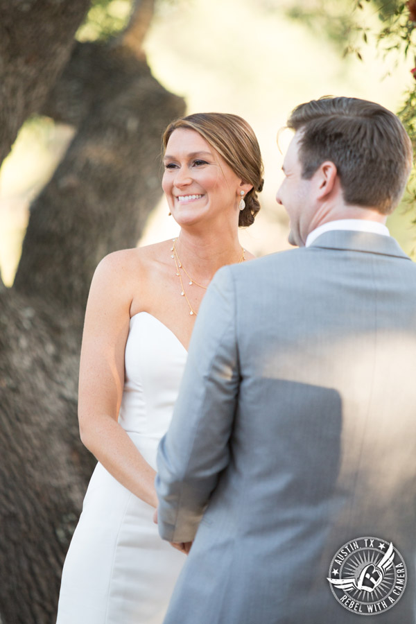 Hamilton Twelve wedding photos - bride smiles during wedding ceremony