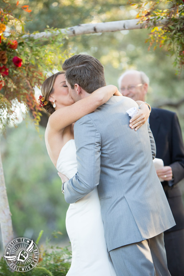 Hamilton Twelve wedding photos - groom and bride kiss at end of wedding ceremony
