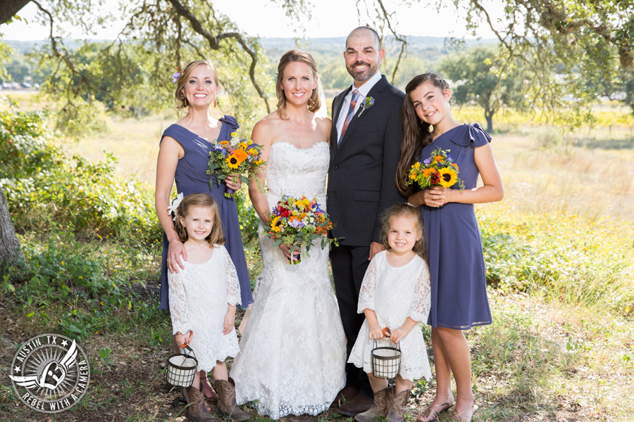 Wedding pictures at Thurman's Mansion at the Salt Lick - wedding party under the oak trees - florals by Verbena Floral Design