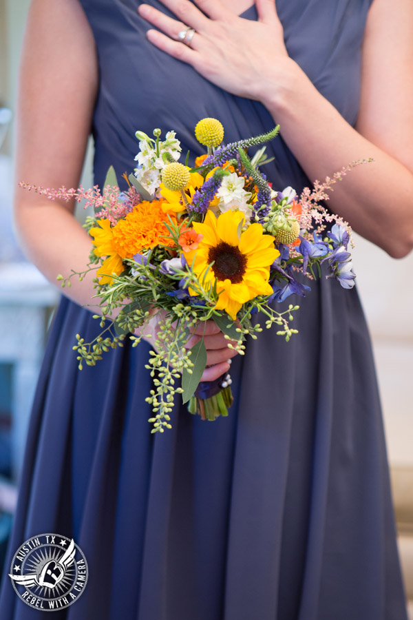 Wedding pictures at Thurman's Mansion at the Salt Lick - colorful wildflower bridesmaid's bouquet by Verbena Floral Design