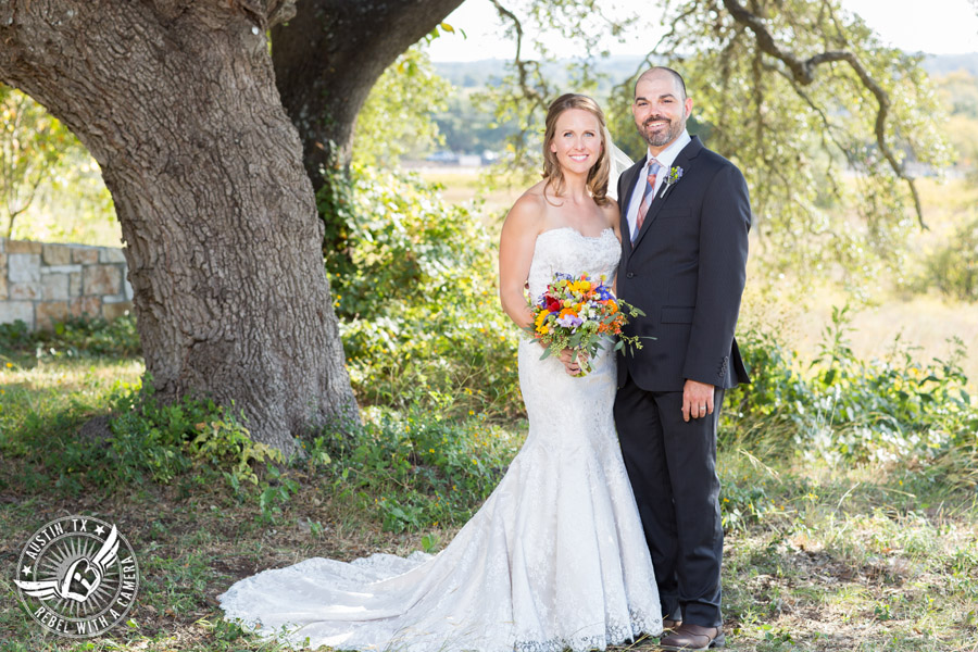 Wedding pictures at Thurman's Mansion at the Salt Lick - bride and groom under the oak trees