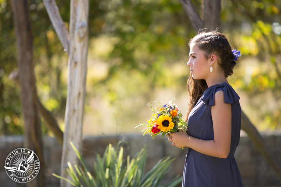 Wedding pictures at Thurman's Mansion at the Salt Lick - bridesmaid at the wedding ceremony