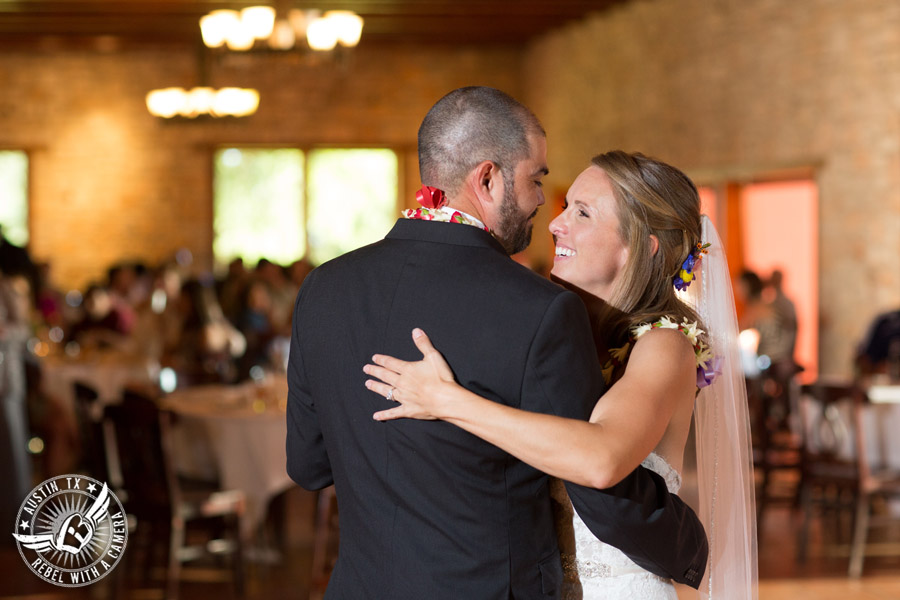 Wedding pictures at Thurman's Mansion at the Salt Lick - bride and groom dance their first dance at the wedding reception - Live Oak DJ