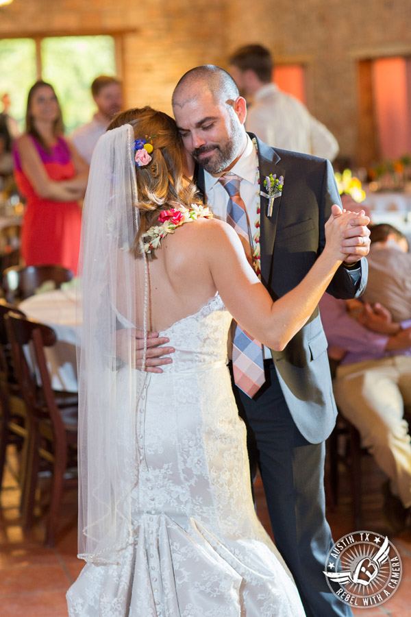 Wedding pictures at Thurman's Mansion at the Salt Lick - bride and groom dance their first dance at the wedding reception - Live Oak DJ