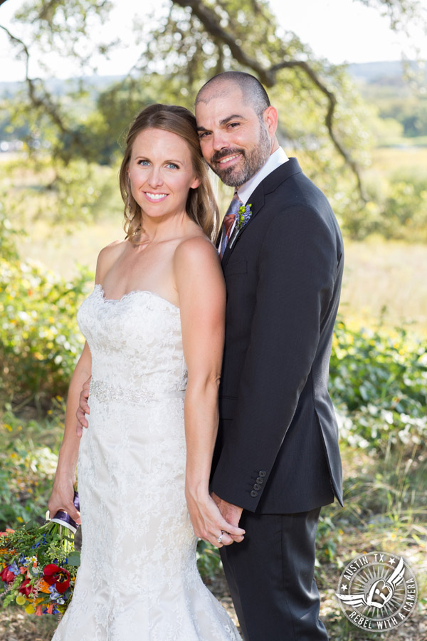 Wedding pictures at Thurman's Mansion at the Salt Lick - bride and groom under the oak trees