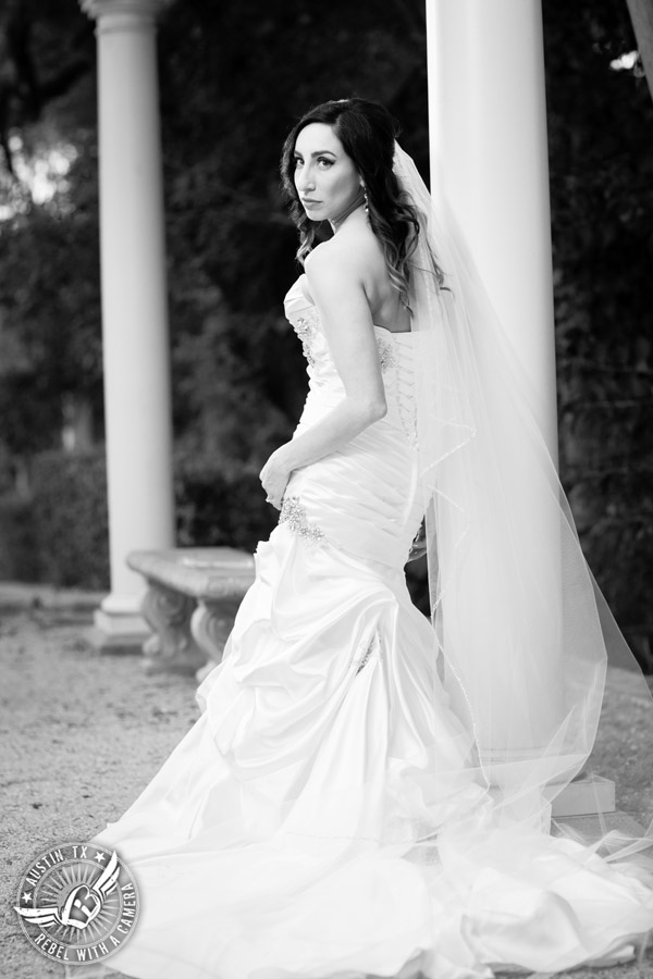 Dramatic bridal portraits at Laguna Gloria the Contemporary Austin with bridal hair styling by Sirens Salon.