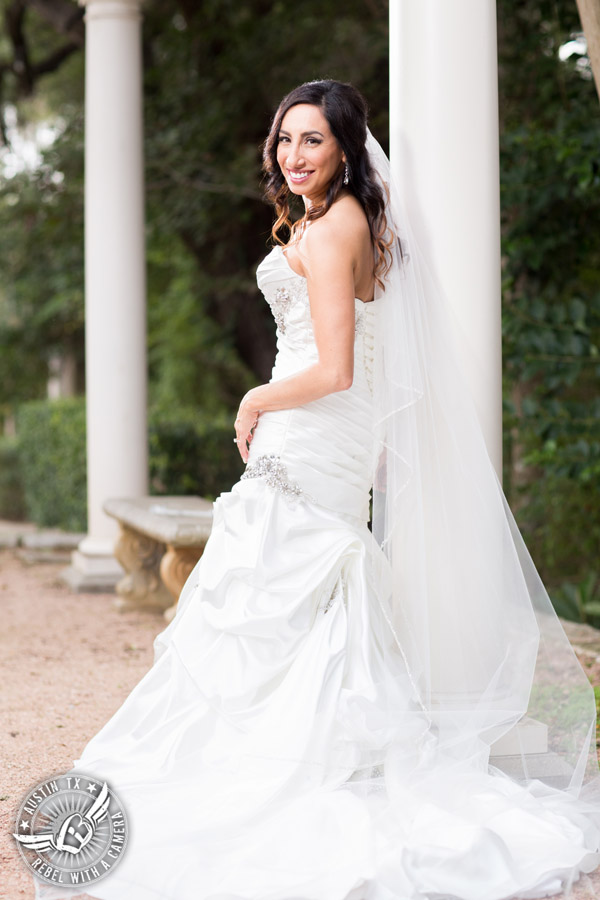 Dramatic bridal portraits at Laguna Gloria the Contemporary Austin with bridal hair styling by Sirens Salon.