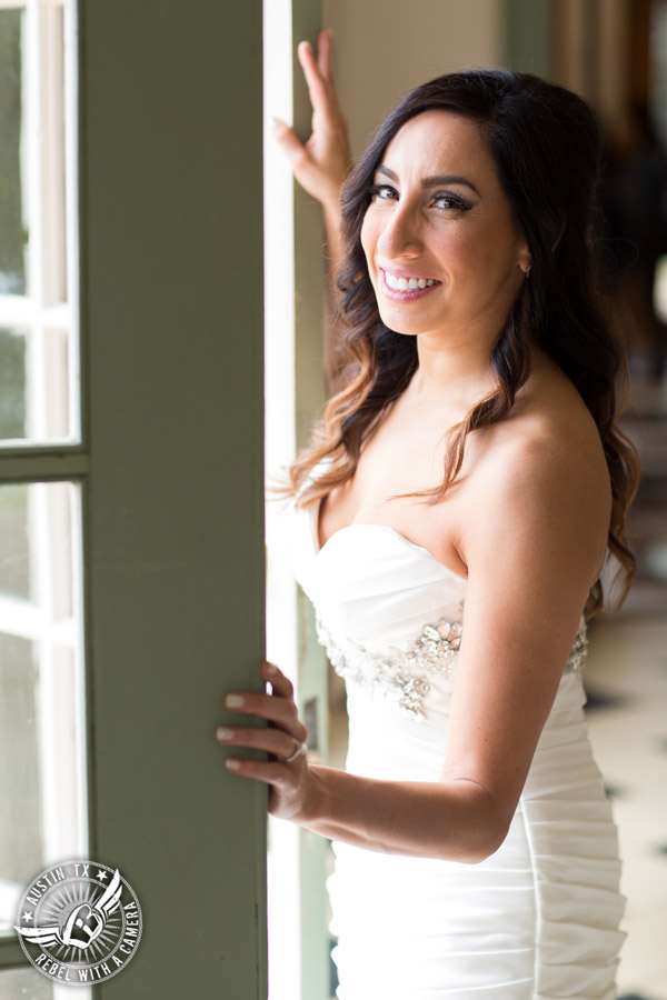 Dramatic bridal portraits at Laguna Gloria the Contemporary Austin with bridal hair styling by Sirens Salon.