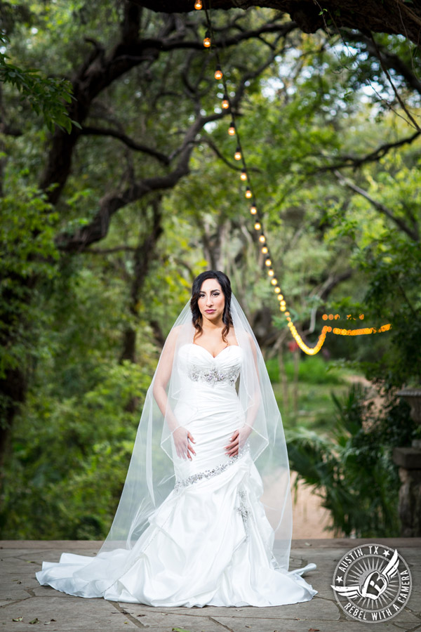 Dramatic bridal portraits at Laguna Gloria the Contemporary Austin with bridal hair styling by Sirens Salon.