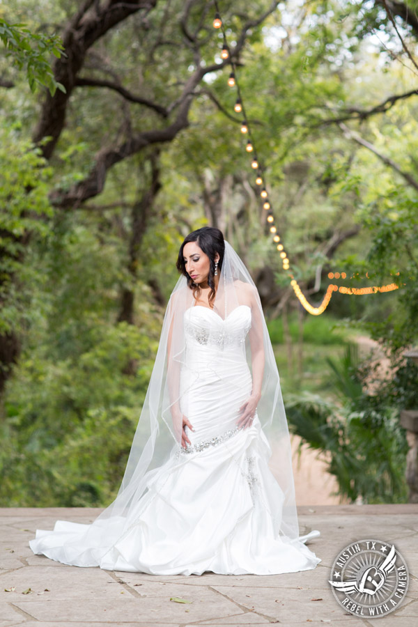 Dramatic bridal portraits at Laguna Gloria the Contemporary Austin with bridal hair styling by Sirens Salon.