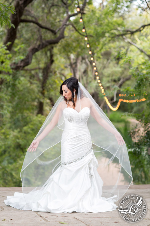 Dramatic bridal portraits at Laguna Gloria the Contemporary Austin with bridal hair styling by Sirens Salon.