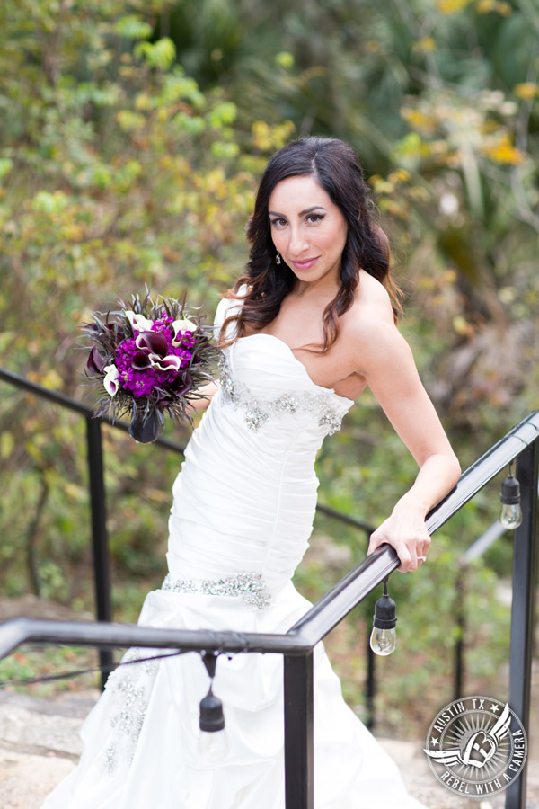 Dramatic bridal portraits at Laguna Gloria the Contemporary Austin with purple calla lily bouquet by Statue of Design.