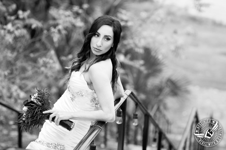 Dramatic bridal portraits at Laguna Gloria the Contemporary Austin with purple calla lily bouquet by Statue of Design.