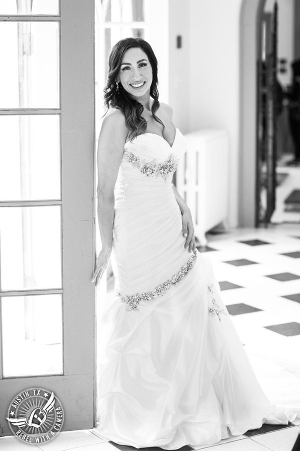 Dramatic bridal portraits at Laguna Gloria the Contemporary Austin with bridal hair styling by Sirens Salon.