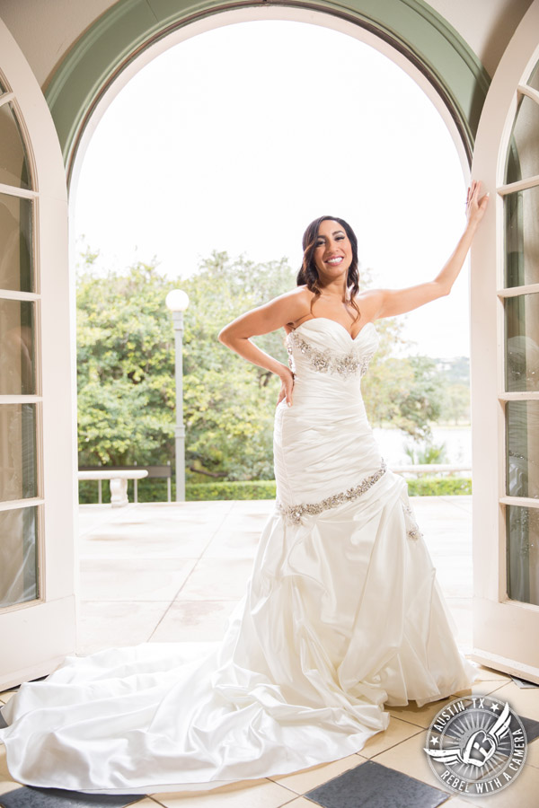 Dramatic bridal portraits at Laguna Gloria the Contemporary Austin with bridal hair styling by Sirens Salon.