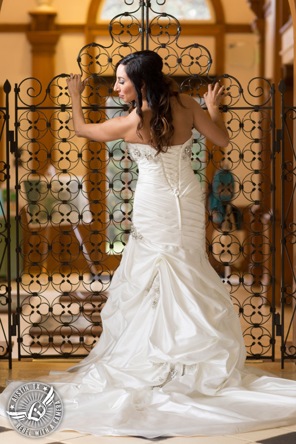 Dramatic bridal portraits at Laguna Gloria the Contemporary Austin with bridal hair styling by Sirens Salon.