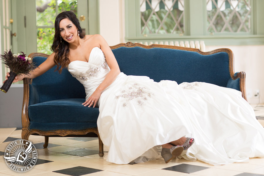 Dramatic bridal portraits at Laguna Gloria the Contemporary Austin with purple calla lily bouquet by Statue of Design.