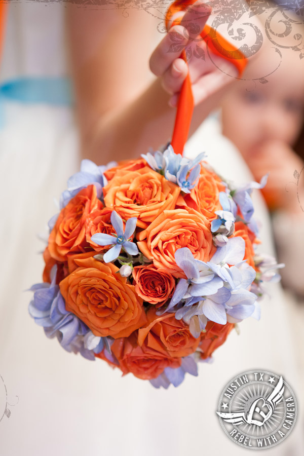 orange and light blue flower girl pomander bouquet