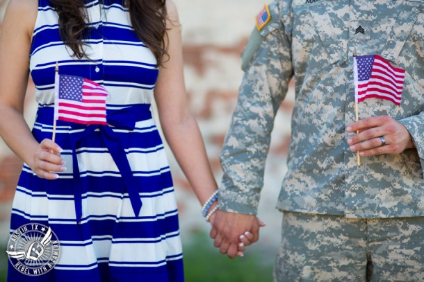 Army engagement pictures in Texas soldier and bride wave American flags