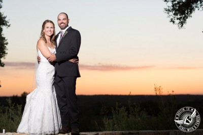 Wedding pictures at Thurman's Mansion at the Salt Lick - bride and groom with the sunset