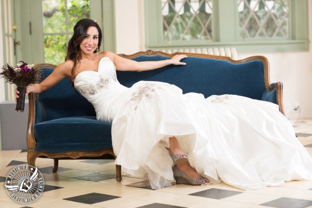 Dramatic bridal portraits at Laguna Gloria the Contemporary Austin with purple calla lily bouquet by Statue of Design.