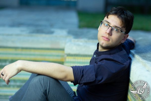 UT Austin senior portrait in empty pool in austin texas